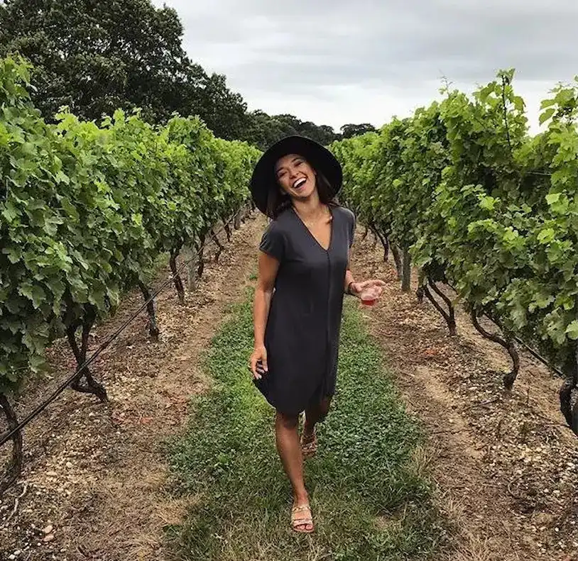 girl smiling in Pugliese vineyard