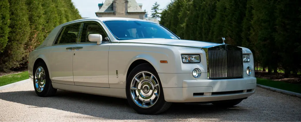 white rolls royce phantom limo